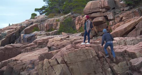 Man Climbing on Rocky Cliff, Forest Mountains Beach National Park Active