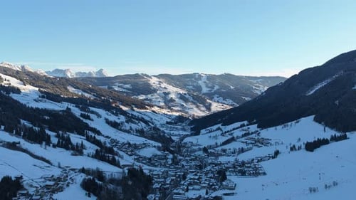 Scenic Winter Wonderland with Saalbach Ski Resort Valley in the Austrian Alps During a Sunny Day