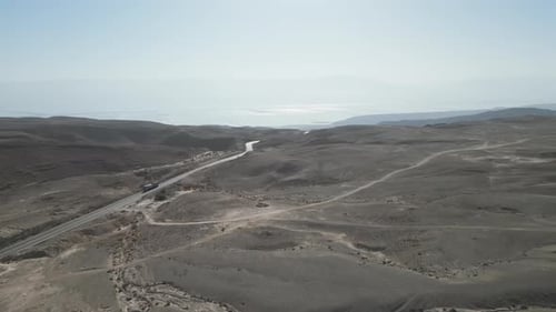 Aerial video over the Judean desert in the Dead Sea area, Israel on a sunny day