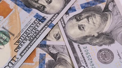 One hundred dollar bills rotate close up macro view. Cash USD money background. 100 dollars