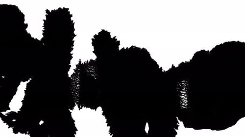 Peinture noire fleurissant au ralenti sur blanc