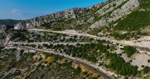 Aerial view away from a winding road on the Makarska riviera, in sunny Croatia