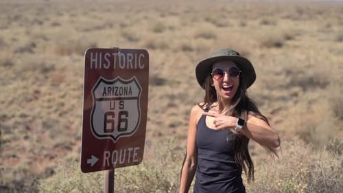 Young Female Posing by Historic Route 66 Sign in Arizona USA, Full Frame
