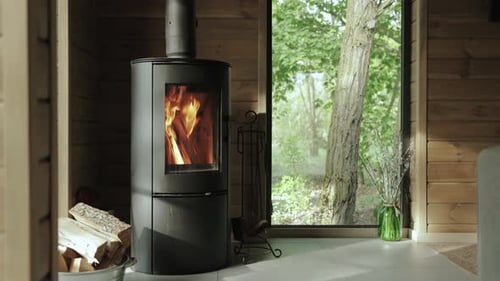 Cozy Cabin Fireplace with Flames in Log Home