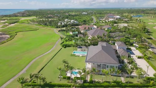 Luxury holiday houses in Puntacana Resort Club, Corales Golf Course, Dominican Republic. Aerial dron