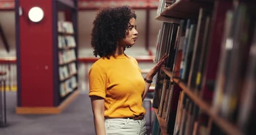 Woman, student and bookshelf with selection in library for choice, knowledge or literature