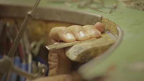 Italian Goldsmith at work building an engagement or a wedding ring.
