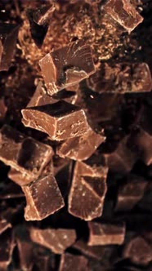 Chunks of Chocolate Fly Up and Fall Down Filmed on a Highspeed Camera at 1000 Fps