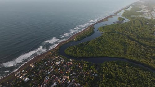 Aerial view of tranquil village by ocean and river, Germany.