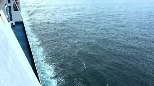 ship sailing the English channel. Blue water giving rise to waves