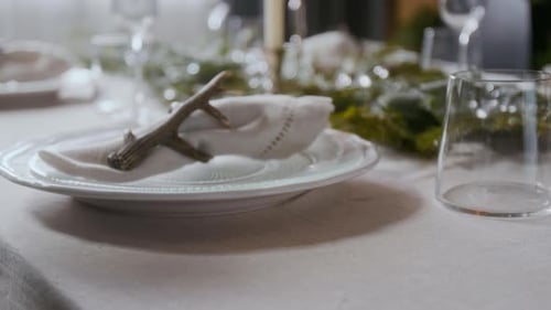 Holiday Table Setting with Decorative Antlers and Napkins