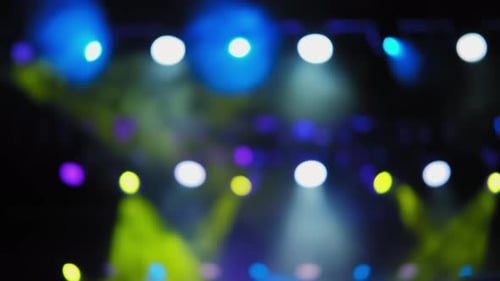 Abstract Blurred Stage Lights in Blue and Yellow