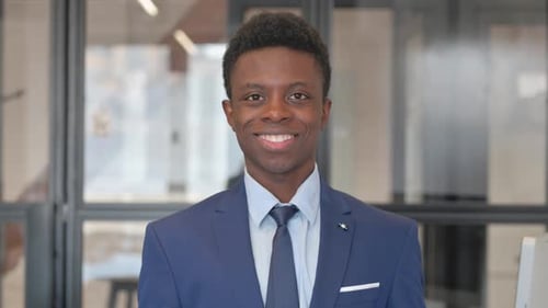 Portrait of Smiling African Businessman in Office