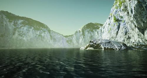 Majestic Cliffs Rise Above Tranquil Waters in a Serene Coastal Setting