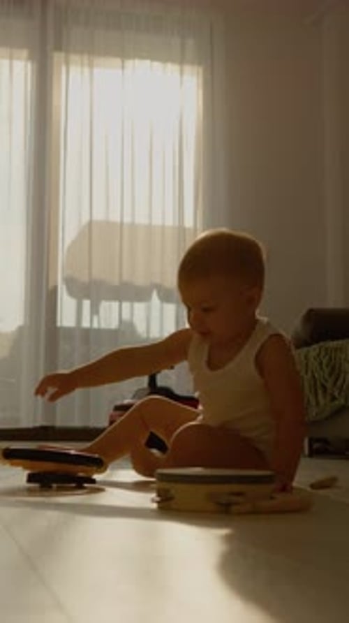 Cute Infant Playing with Toys in Living Room
