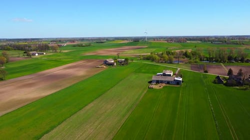Aerial view of green fields and farms