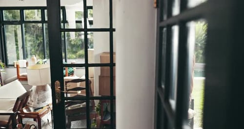 Man, relocation and moving box in home, walking and property investment or real estate mortgage