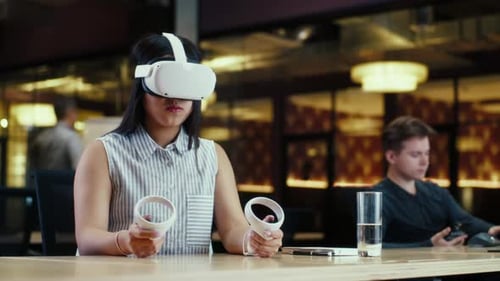 Female Office Worker Using VR Headset