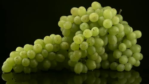 Close Up of Fresh Green Grapes on Black