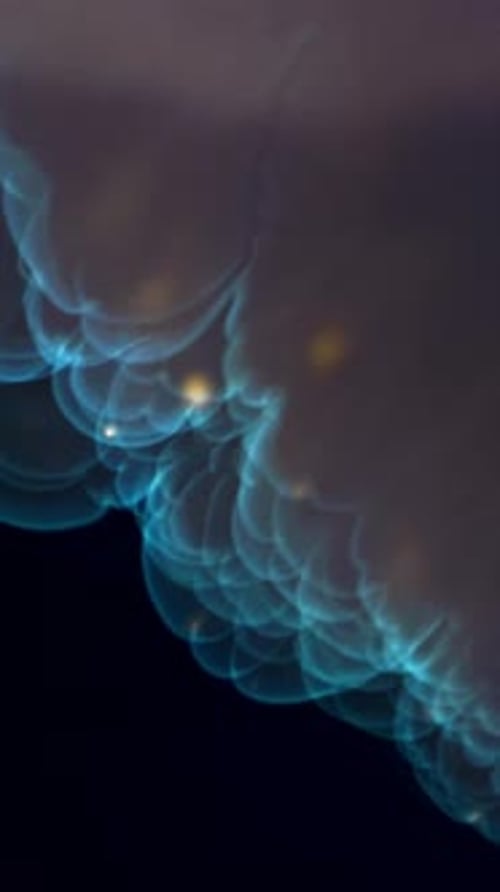 Bords bioluminescents et diffusion de particules colorées filmés par une caméra haute vitesse à 1000 images par seconde