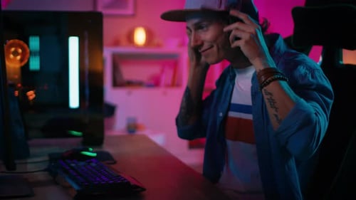 Man Puts On Headset and Plays Computer Game