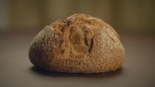Freshly Baked Rustic Bread on Dark Surface
