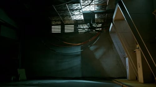 Gritty Industrial Environment with Rotating Fan and Flickering Lights