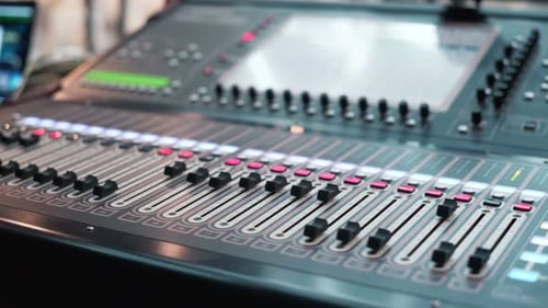 Audio Mixer in a Studio, the Automatic Knobs Moving. Everything Is Ready