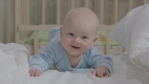 Three Month Old Baby Boy Laying On Bed 14