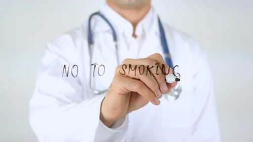 No to Smoking Doctor Writing on Glass
