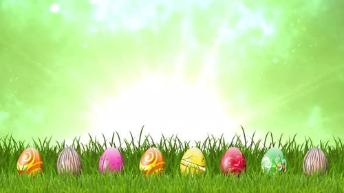 Vibrant Easter Eggs on Green Grass with Bright Sky Background