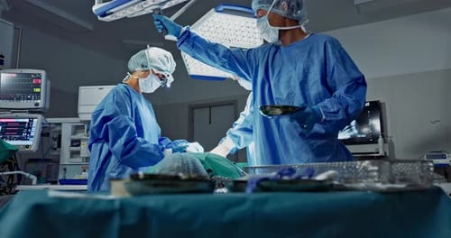 Doctors, teamwork and surgery in theater with medical support for healthcare