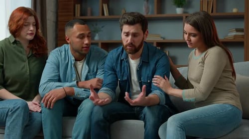 Friends Offer Comfort and Support on Couch