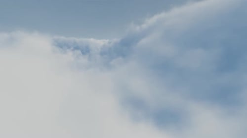 Flying Through Soft White Clouds in Blue Sky Time-Lapse