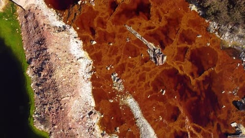 Aerial drone view of Mining activity. Apocalypse scenery. Earth destruction. Disruption of nature.