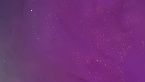 Colorful Purple Abstract Background with Glittering Particles
