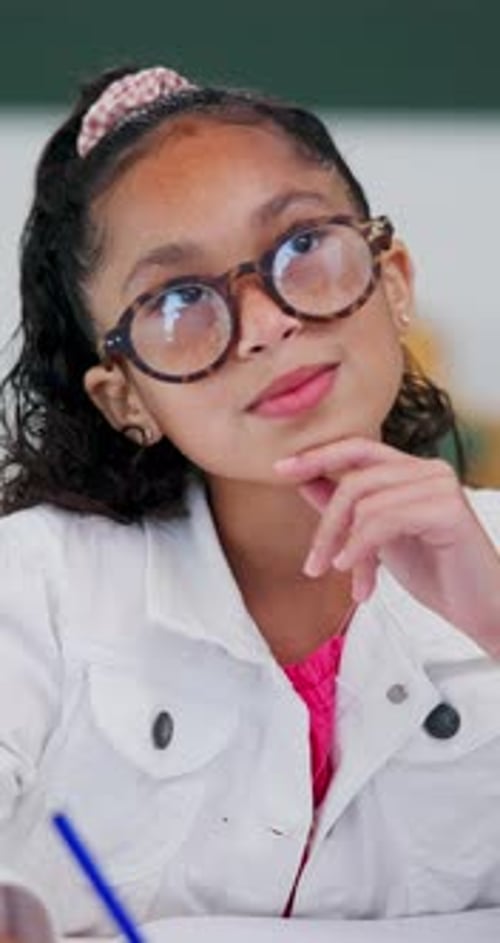 Thinking, child and student with glasses in bedroom for learning, problem solving