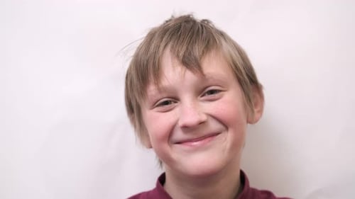 Close Up Emotional Portrait of Caucasian Smiling Teenager Boy