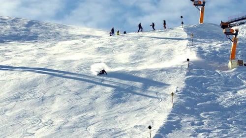 Action skiing fast ski racing turns on a steep ski slope. Fast carving ski turns, action ski shootin