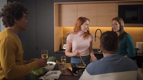 Friends Cooking Together in Modern Kitchen