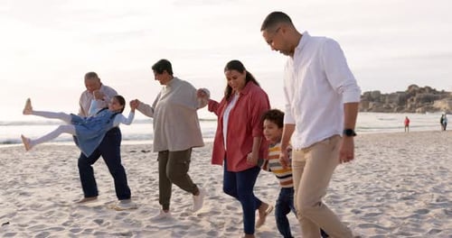 Big family, holding hands and walking on beach at sunset for vacation, holiday or adventure