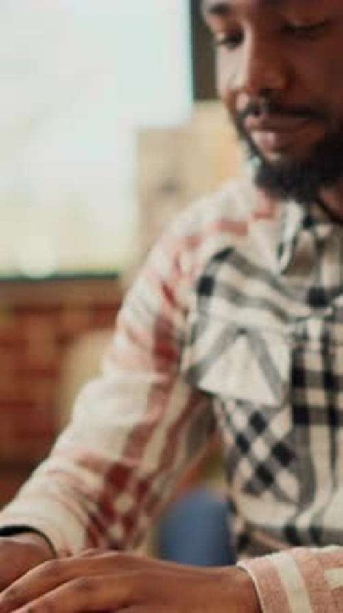 Vertical Video Young Man Typing Online Data on Company Laptop