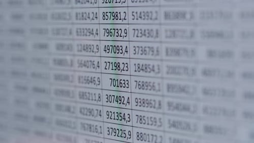 Finance Data Closeup of Financial Cash Flow Stocks Bitcoin Data on PC Screen Tax Report Year