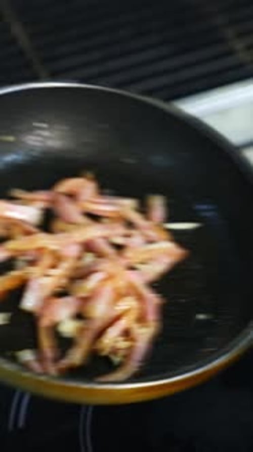 Cooking Bacon and Garlic in Frying Pan
