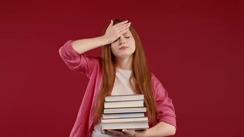 Lazy Woman Student is Dissatisfied with Amount of Books Homework on Red Background