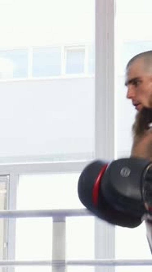 Intense Boxing Training with Punching Drills in Ring
