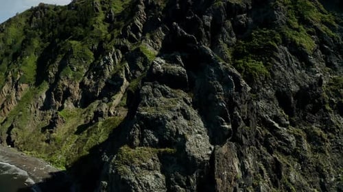 Drone Flying Around the Mountains on the Sea Coast