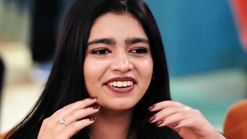 Young Woman Smiling Expressing Happiness Personality and Confidence