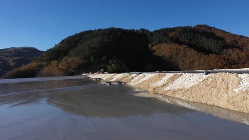 Aerial View of Mining Residuals Flowing into Decanting Pond from a Copper Mine