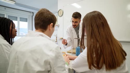 Enthusiastic Science Teacher with Students in Classroom